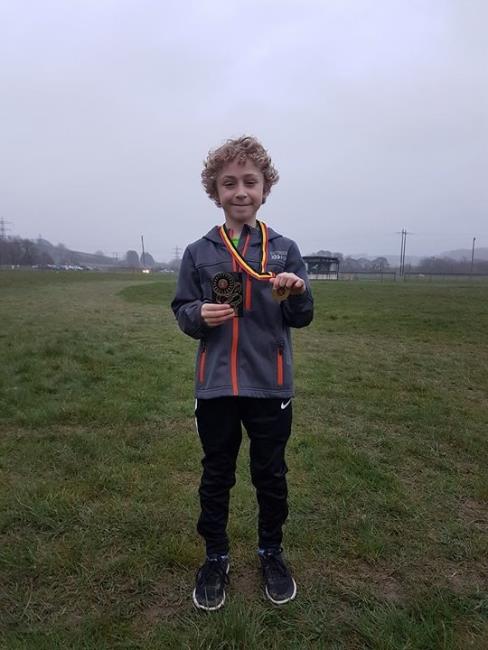 Rowan Dixon with medals